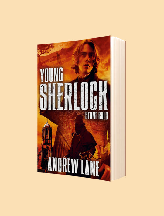 A 3D mockup of a paperback book titled 'Young Sherlock Stone Gold' by Andrew Lane, displayed at an angle against a solid light beige background.