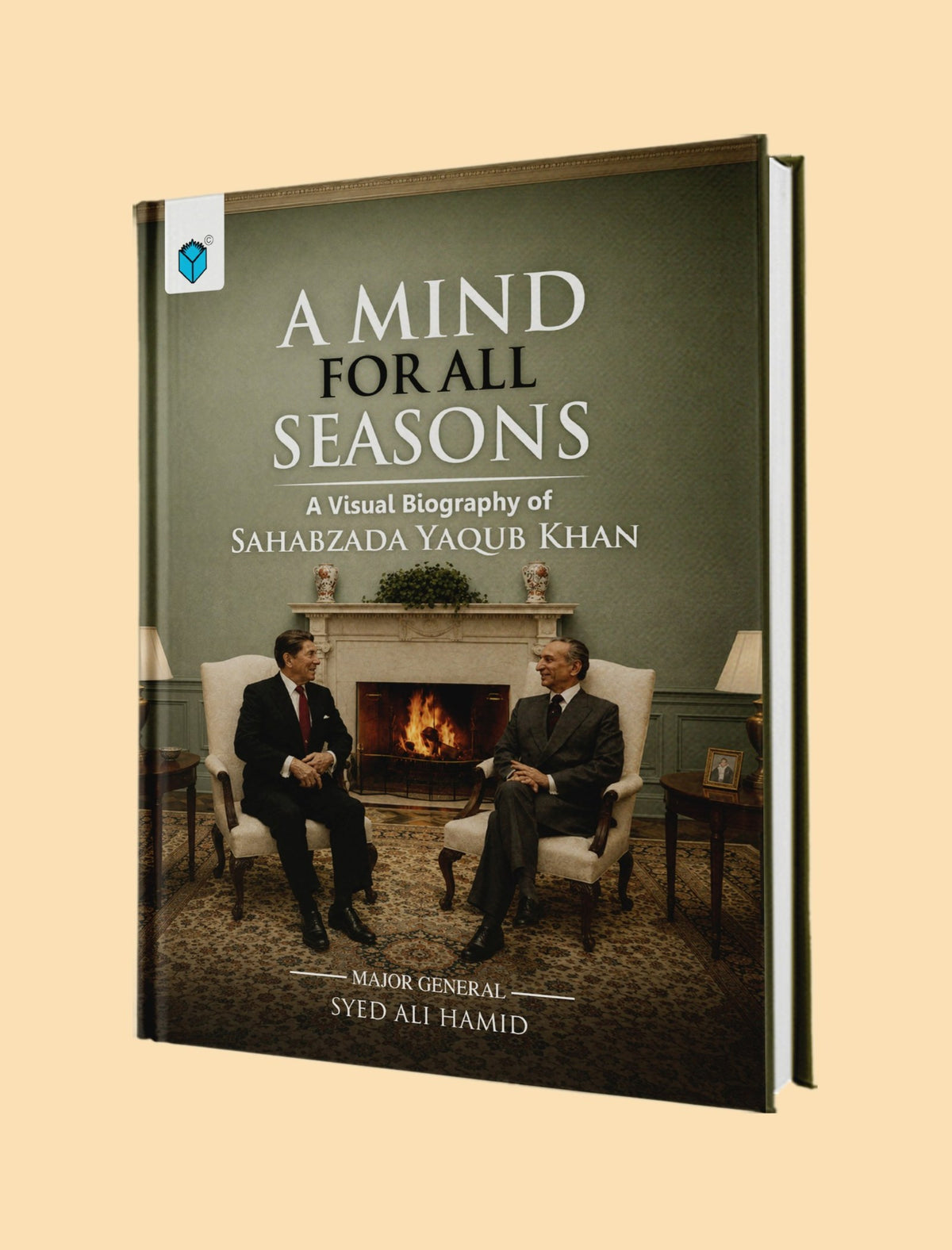 A hardcover book titled 'A Mind for All Seasons: A Visual Biography of Sahabzada Yaqub Khan' by Syed Ali Hamid, shown standing upright against a solid beige background. The cover features a photograph of the two men sitting by a fireplace.