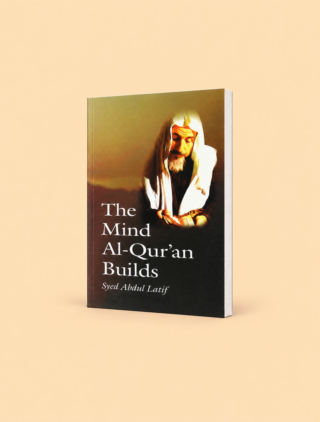 The Mind Al-Qur'an Builds book by Syed Abdul Larif, featuring a portrait of the Prophet Muhammad on the cover, displayed on a warm beige background.